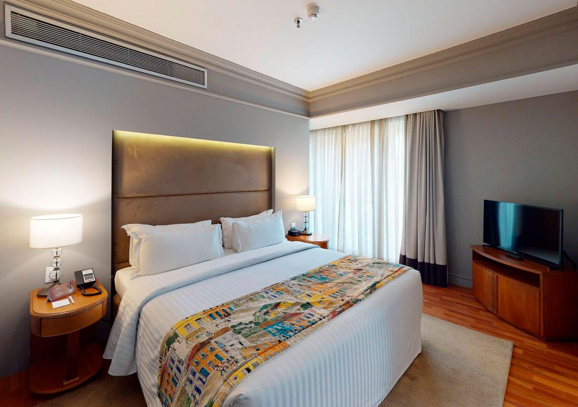 Gran Estanplaza Berrini Hotell São Paulo Eksteriør bilde A bedroom at the Taj Bengal
